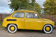 © kalichka - Yellow car vintage style