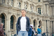 © golovianko - Tourist in Louvre, Paris, France