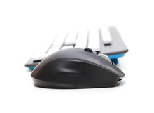 Computer Mouse And Keyboard On White Background