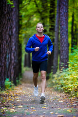 Wall Mural - Healthy lifestyle - young man running