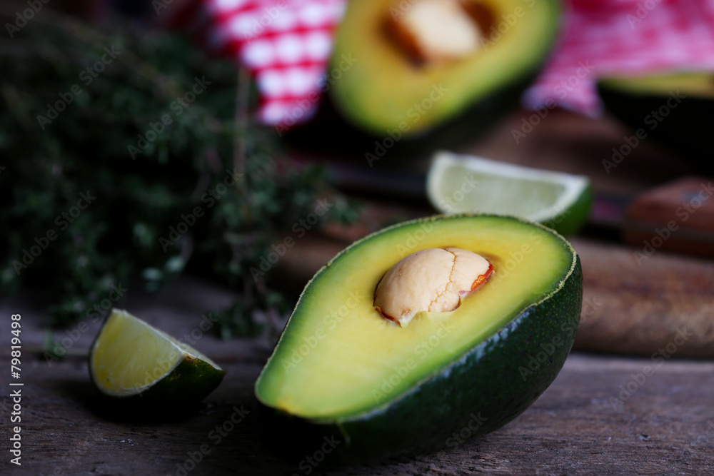 Sliced avocado with lime and herb