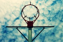 Old Neglect Basketball Backboard With Rusty Hoop Above Street 