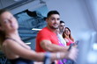 © .shock - Group of people running on treadmills