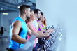 © .shock - Group of people running on treadmills