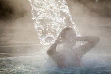 Young Woman Relaxing In Thermal Pool.