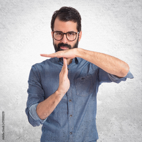 Fotografie, Obraz Young hipster man making time out gesture