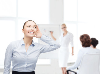 Poster - smiling businesswoman listening gossig