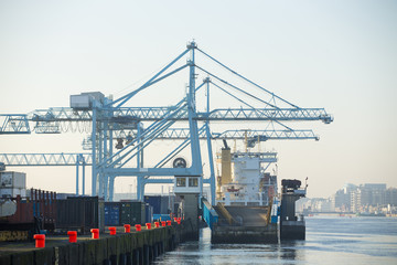 Commercial harbor with large industrial cranes