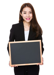 Businesswoman show with black board