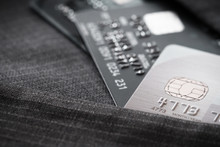 Credit Cards In Very Shallow Focus  With Gray Suit Background