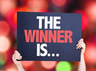 Wall Mural - the winner is... card with bokeh background