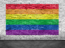 Rainbow Flag Painted Over White Brick Wall