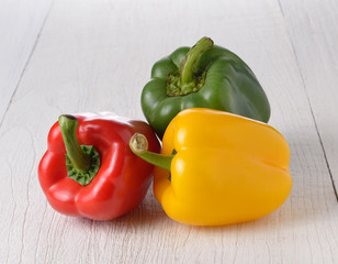 Fresh peppers on wooden