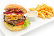 Hamburger with french fries om white plate