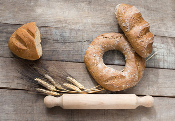 doughnut bread and cereal french bread over wood