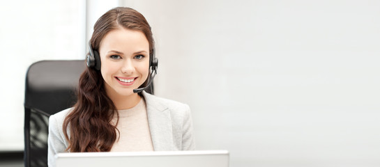 helpline operator with laptop computer