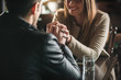 © StockPhotoPro - Loving couple at the bar