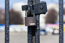 The Lock On The Fence