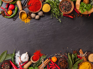 Wall Mural - Various spices on black stone