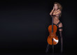 Sexy beautiful woman posing with cello.