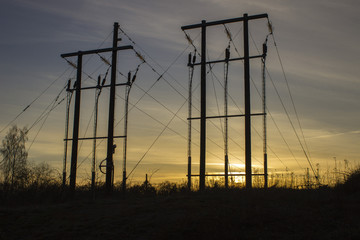 Power lines in sunset - silhouettes