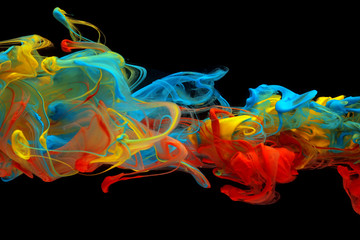 colorful ink swirling through water