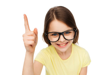 Poster - smiling little girl in eyeglasses