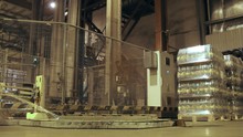 Special Machine Wrap Up By Overwrap Of Container With Kvass Bottles At Nonalcoholic Plant, Time Lapse