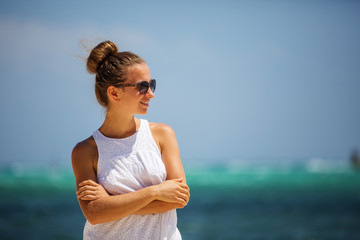 Wall Mural - Caucasian woman rests at beautiful seashore