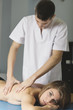 © DalaiFood - Beautiful young woman relaxing with hand massage at beauty spa