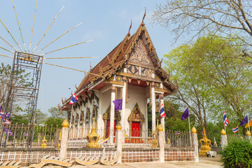 temple with tree under sun light at Wat kaihob