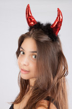 Woman In Red Devil Horns