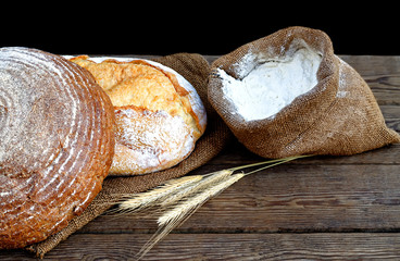 two bread and flour in a sack