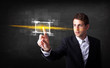 © ra2 studio - Tech business person touching button with orange light beams con