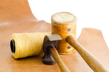 leather hammer and hand tool for shoemaker in his workshop repai