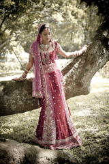 Wall Mural - happy beautiful hindu Indian bride outdoors smiling having fun