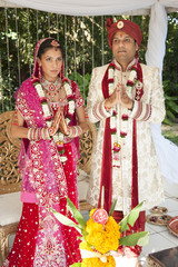 Canvas Print - Young hindu Indian bridal couple at their wedding