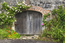 Charming Rose Covered Wall And Stable Doors