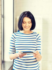 Canvas Print - happy teenage girl with tablet pc computer