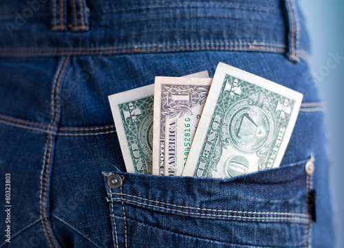 Fotografía one dollars banknotes in a pocket of jeans