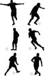 Soccer players in silhouettes