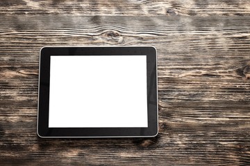 Poster - Ipad. Digital tablet computer with isolated screen on old wooden