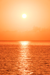 Wall Mural - Beautiful tropical sunset ocean background