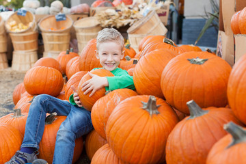 kid at pumpkin patch