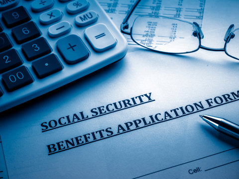 social security benefits application form on the desk.