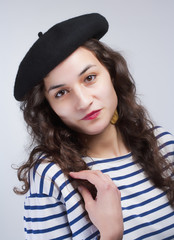 Young Beautiful Woman with French Style Beret and Striped T-Shir