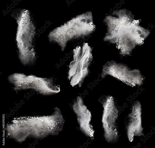 Abstract design of white powder cloud against black
