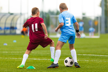 Football soccer game. Running players playing match