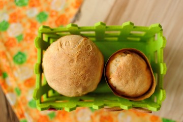 Wall Mural - Paska, East European easter sweet breads in green basket