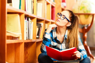 Wall Mural - Woman student in college library